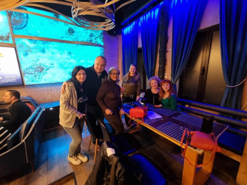 Happy Expats smiling at you